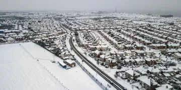Heavy snow brings widespread disruption across the UK and Germany