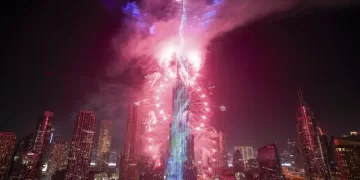 World welcomes 2025 with light shows, embraces and ice plunges