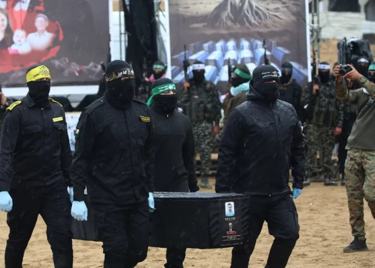 Hamas returns black coffins with remains of Israeli family 1 - Egyptian Gazette