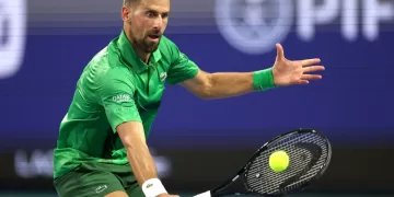 Djokovic marches into Miami quarters as Ruud exits