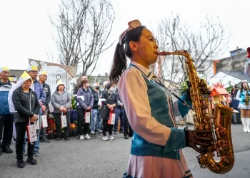 All-women marching band livens up Taiwanese funerals
