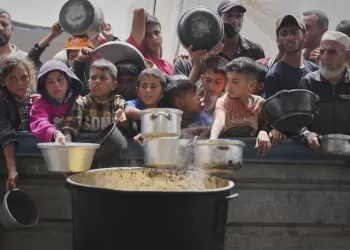 Desperate children and adults in Gaza struggle to get food as Israel blocks aid