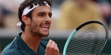 Big names crash but Italians shine on damp day at French Open