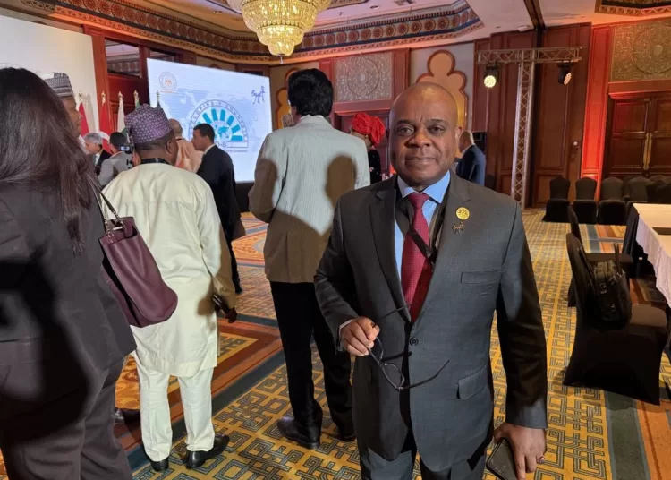 D-8 Secretary-General Isiaka Abdulqadir Imam posing for a photo during his interview with The Egyptian Gazette