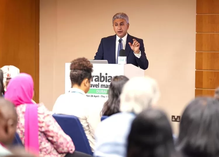 The Minister of Tourism speaks at an international press conference in Dubai.