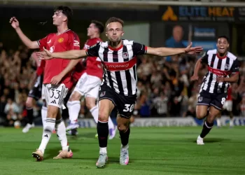 Man United crash out of League Cup in Paris as fourth-tier Grimsby seal shock win