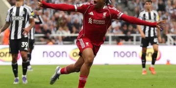 Liverpool fends off late fightback