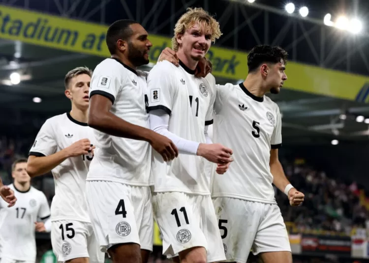 Nick Woltemade (C) celebrates after scoring the winner for Germany against Northern Ireland in Belfast.