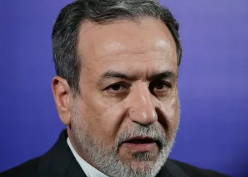 Iran’s foreign minister says the nation is no longer enriching uranium at any site in the country