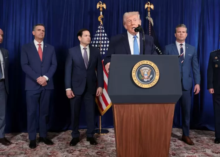 Maduro in US custody; loyalists defiant 1 - Egyptian Gazette Trump speaking during a press conference following a US strike on Venezuela, during which Maduro and his wife were captured.