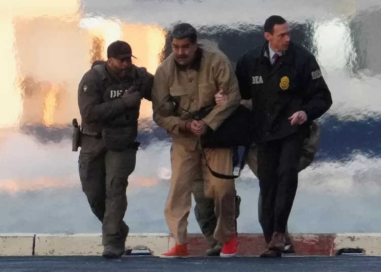 Captured Venezuelan President Nicolas Maduro is escorted, as he heads towards the Daniel Patrick Manhattan United States Courthouse for an initial appearance to face U.S. federal charges including narco-terrorism, conspiracy, drug trafficking, money laundering and others in New York City