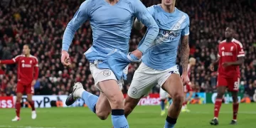 Late Haaland goal sinks Liverpool