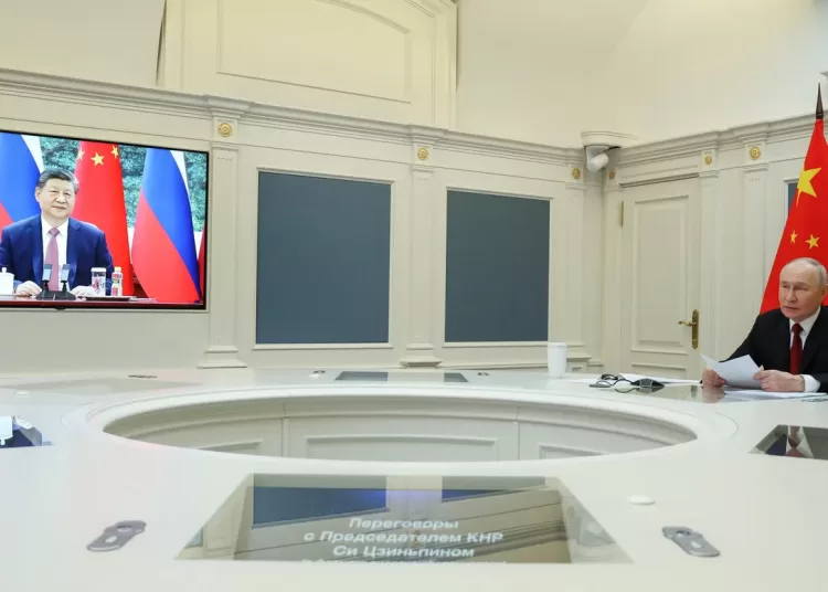 Xi, Putin hail ties in video call as Ukraine war nears anniversary 1 - Egyptian Gazette