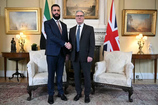 UK Starmer discusses migration, borders with Syria’s leader 12 - Egyptian Gazette Britain’s Prime Minister Keir Starmer, right, meets with the President of Syria Ahmed Al-Sharaa in Downing Street, London, Tuesday, March 31, 2026. (AP)