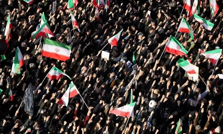 People gather to mourn after Iran's Supreme Leader Ali Khamenei was killed in Israeli and US strikes on Saturday, in Tehran, Iran, March 1, 2026.