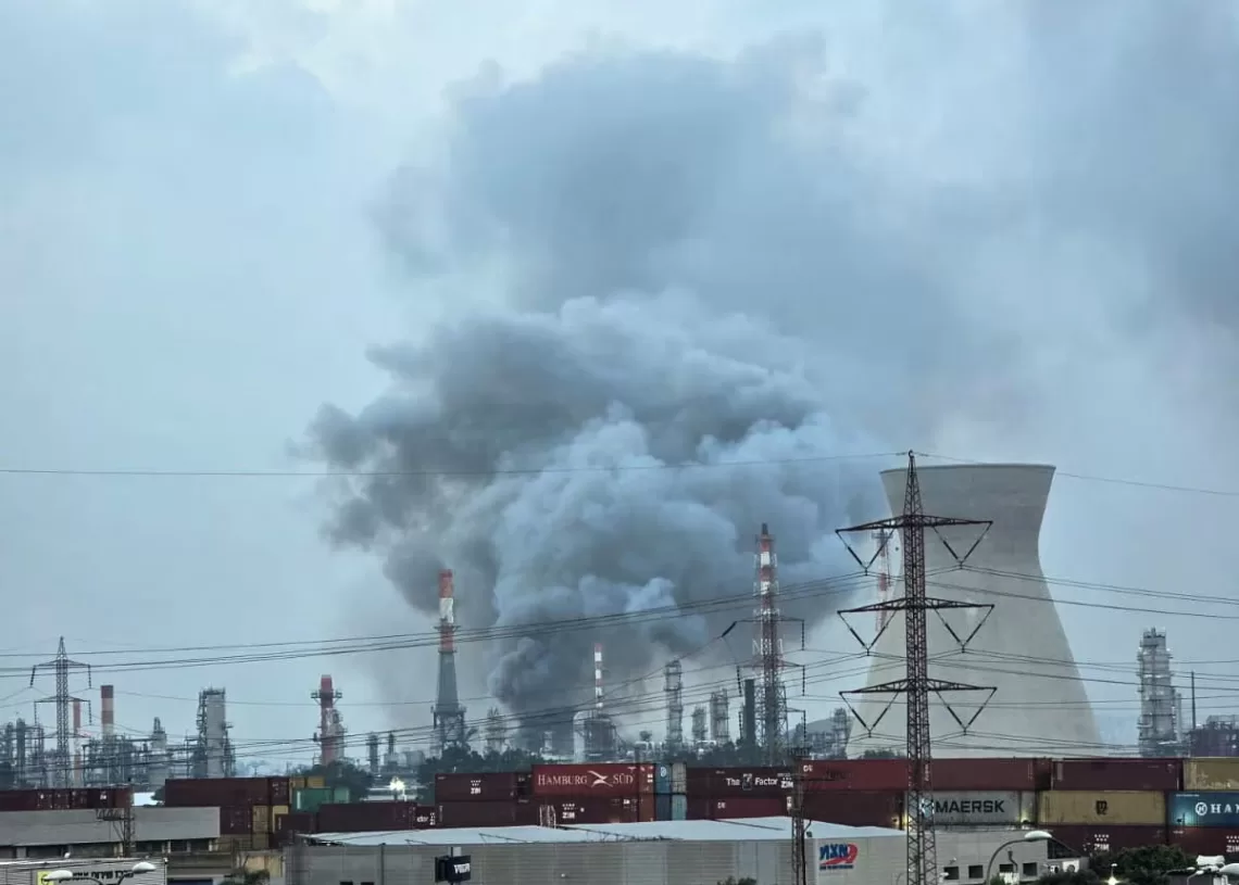 Smoke rises from an oil refinery that was damaged in an Iranian attack, amid the U.S.-Israel conflict with Iran, in Haifa, Israel, March 19, 2026.