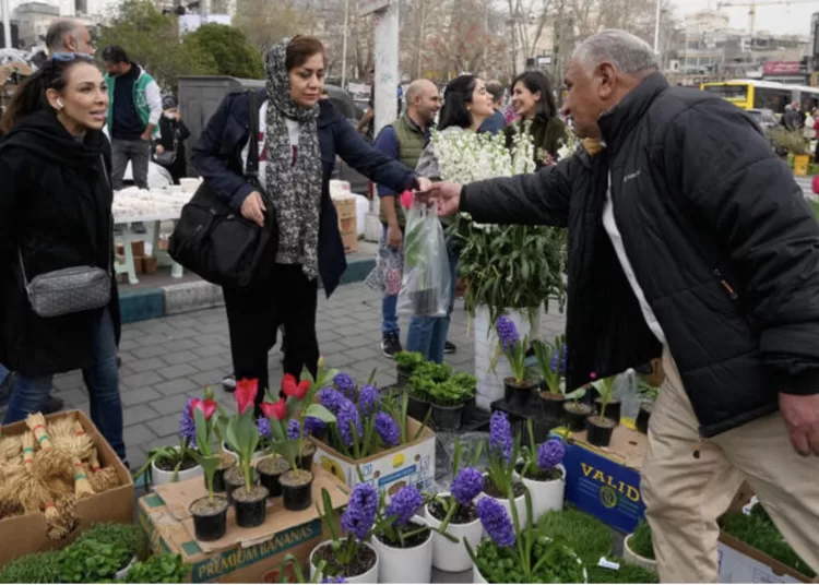 Iranians living abroad are approaching Persian new year with grief and fear as war and a crackdown cut them off from loved ones inside Iran. (AP)