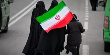 Iran warns of strikes on tourist sites, keeps missile work going