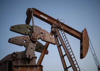 Oil rises as disruptions continue, Iran denies US talks