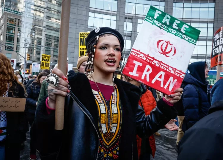 People march during a protest in New York against U.S. and Israeli strikes on Iran.
