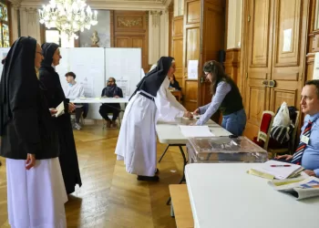 Paris, Marseille in focus as French vote in runoffs