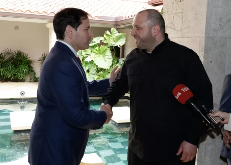 Secretary of State Marco Rubio, left, and Secretary of the National Security of Ukraine Rustem Umerov shake hands, Nov. 30, 2025, in Hallandale Beach, Fla.