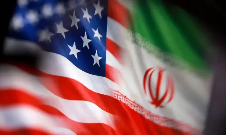 US and Iranian flags. (Reuters)