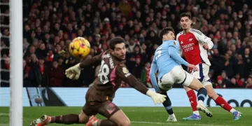 Arsenal wary of in-form Man City hunt
