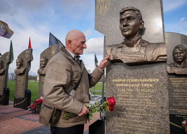 Petro Hurin, 76, one of hundreds of thousands of ‘liquidators’ brought to clean up the aftermath of the explosion that tore apart reactor Four of the Chornobyl nuclear plant in Ukraine on April 26, 1986, visits a monument dedicated to his grandson Andrii, a Ukrainian serviceman killed at the age of 26 while fighting near Bakhmut in Ukraine’s eastern Donetsk region in 2023, at a memorial in Cherkasy region, Ukraine April 7, 2026.