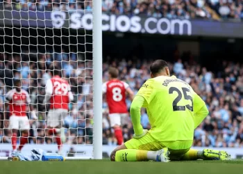 City edges Arsenal despite Donnarumma error