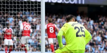 City edges Arsenal despite Donnarumma error