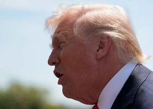 U.S. President Donald Trump speaks to the media, as he departs the White House for Las Vegas, Nevada, in Washington, D.C., U.S., April 16, 2026. REUTERS/
