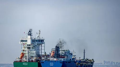 US sends 6,500 tons of arms to Israel in 24 hours 12 - Egyptian Gazette CARGO SHIPS with containers are seen off the coast of of the southern Israeli city of Ashdod, August 6, 2024. Illustrative. (photo credit: CHAIM GOLDBERG/FLASH90)