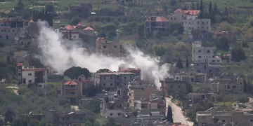 Israel presses assault on Lebanon border town