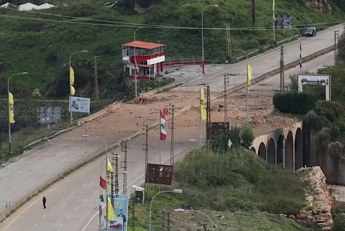 Israel to strike east Lebanon bridges; evacuations urged 11 - Egyptian Gazette Debris covers the damaged area of a bridge after an Israeli strike, following an escalation between Hezbollah and Israel, amid the U.S.-Israeli conflict with Iran, near Qasmiyeh, Lebanon, March 22, 2026. REUTERS