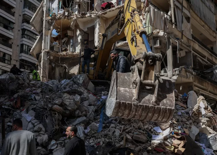 Israeli strikes in Lebanon threaten Iran truce; Strait stays closed 11 - Egyptian Gazette Emergency services operate at the site of an Israeli strike carried out on Wednesday, in Ain Al Mraiseh in Beirut, Lebanon, April 9, 2026. REUTERS