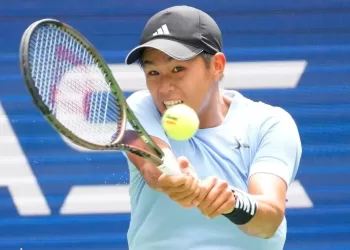 Tien aims high on Madrid debut