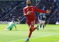 Liverpool seals late derby win