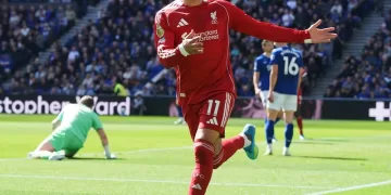 Liverpool seals late derby win