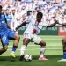 Lyon boosts Champions League push