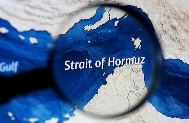 Iran’s Guards to view military vessels approaching strait violation