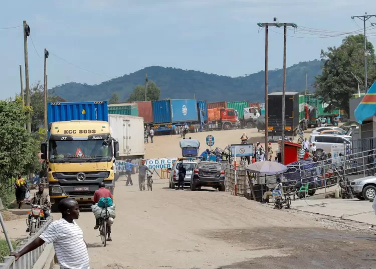 WHO: 906 suspected Ebola cases, 223 suspected deaths 12 - Egyptian Gazette People walk , after Uganda closed its borders with the Democratic Republic of Congo, as authorities intensify efforts to contain a new Ebola outbreak caused by the Bundibugyo virus strain, at the Mpondwe border post, in Kasese district, Uganda, May 28, 2026. REUTERS/