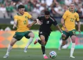 Australia chases upset against co-hosts