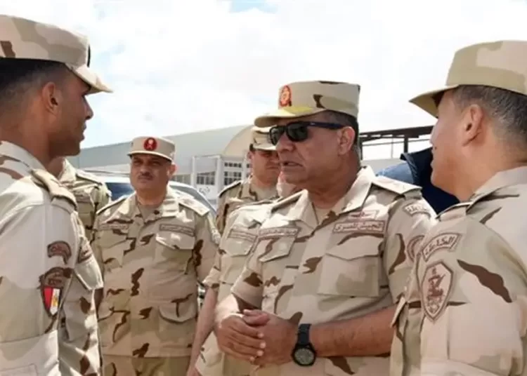 Defence Minister.