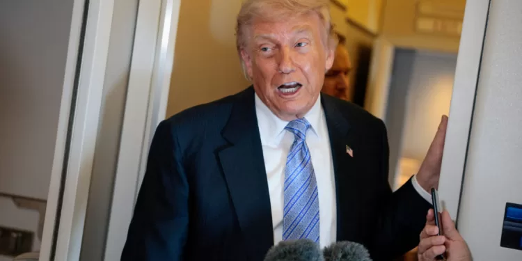FILE PHOTO: U.S. President Donald Trump speaks to the press aboard Air Force One enroute to the U.S.  following his official visit with President Xi Jinping in China, May 15, 2026. REUTERS/Evan Vucci/File Photo