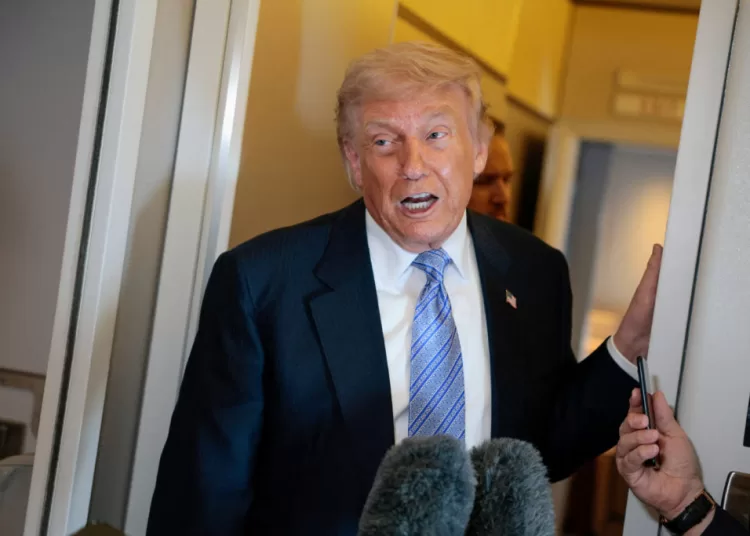 FILE PHOTO: U.S. President Donald Trump speaks to the press aboard Air Force One enroute to the U.S.  following his official visit with President Xi Jinping in China, May 15, 2026. REUTERS/Evan Vucci/File Photo