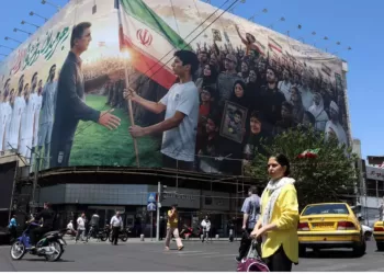 Iran warns against renewed US attacks as Trump says held off assault