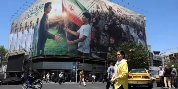 Iran warns against renewed US attacks as Trump says held off assault