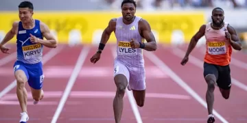 Lyles triumphs in Tokyo sprint