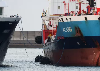 Two test positive as evacuation of virus-hit cruise ship nears completion